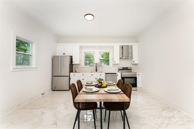 617 N Juniper Ave, Kannapolis, NC 28081 - dining area with light marble finish flooring and baseboards
