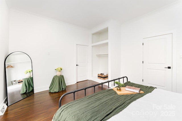 617 N Juniper Ave, Kannapolis, NC 28081 - bedroom with wood finished floors and baseboards