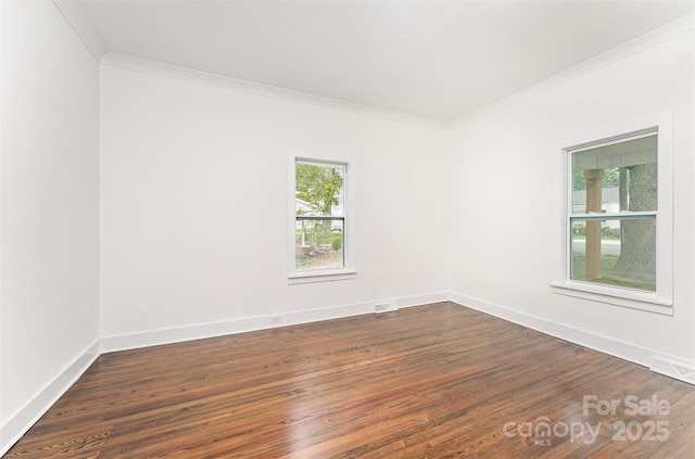 617 N Juniper Ave, Kannapolis, NC 28081 - empty room featuring crown molding and dark wood finished floors
