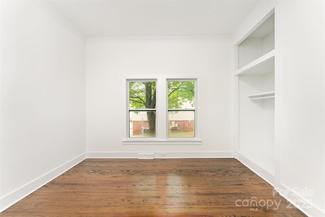 617 N Juniper Ave, Kannapolis, NC 28081 - empty room featuring crown molding and wood finished floors
