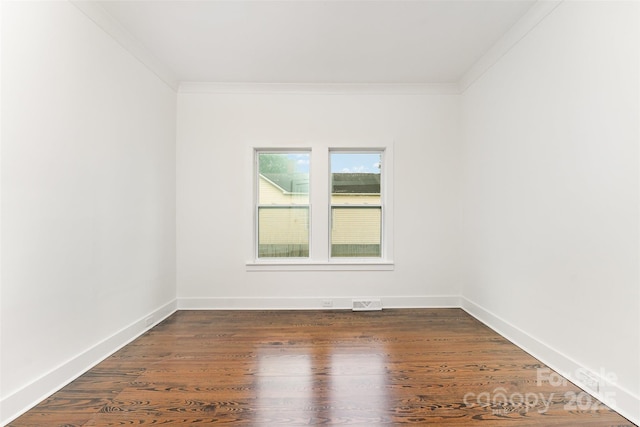617 N Juniper Ave, Kannapolis, NC 28081 - spare room with crown molding and dark wood finished floors