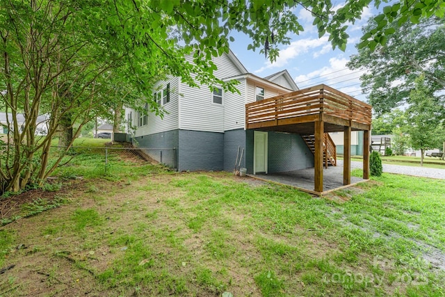 617 N Juniper Ave, Kannapolis, NC 28081 - back of house with a deck, stairway, and a patio