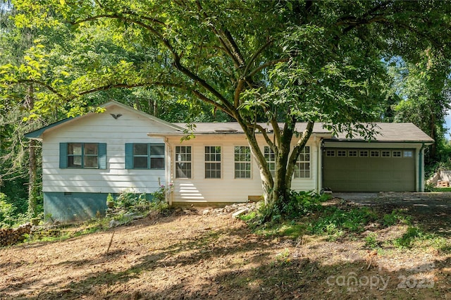 18 Peaceful Valley Ln, Flat Rock, NC 28731 - ranch-style house featuring an attached garage, dirt driveway, and crawl space