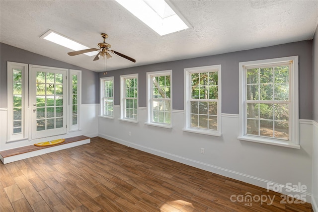 18 Peaceful Valley Ln, Flat Rock, NC 28731 - unfurnished sunroom featuring a skylight, lofted ceiling, and french doors