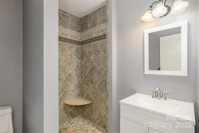 18 Peaceful Valley Ln, Flat Rock, NC 28731 - bathroom with tiled shower and vanity