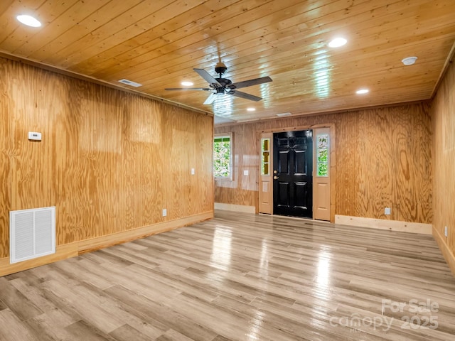291 Pine Ridge Rd, Hendersonville, NC 28792 - spare room featuring wooden walls, ceiling fan, wood finished floors, wood ceiling, and recessed lighting