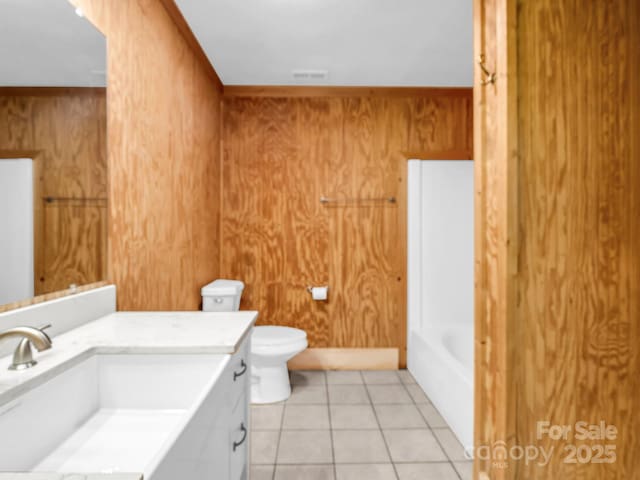 291 Pine Ridge Rd, Hendersonville, NC 28792 - full bathroom with vanity, a tub, tile patterned floors, and wood walls