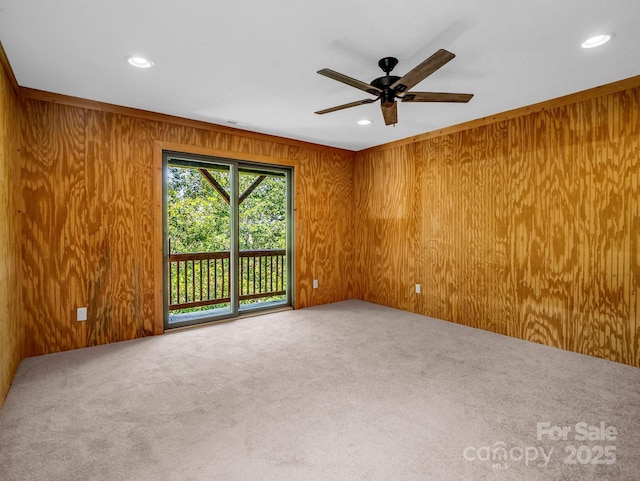 291 Pine Ridge Rd, Hendersonville, NC 28792 - spare room with wood walls, carpet flooring, ceiling fan, and recessed lighting