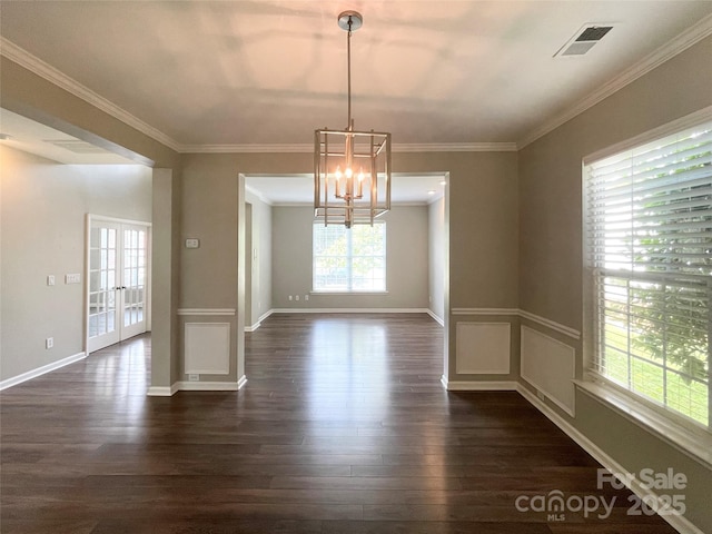 2834 Ritz Ln, Matthews, NC 28105 - unfurnished dining area featuring dark wood-type flooring, a chandelier, ornamental molding, and french doors