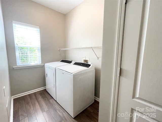 2834 Ritz Ln, Matthews, NC 28105 - washroom featuring washing machine and clothes dryer and wood finished floors