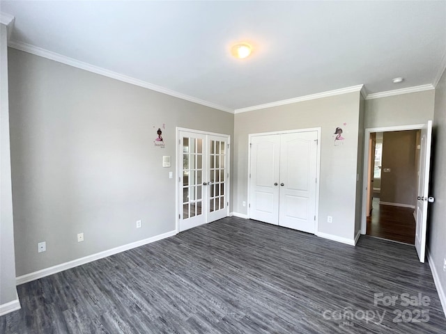 2834 Ritz Ln, Matthews, NC 28105 - unfurnished bedroom with french doors, dark wood-style floors, ornamental molding, and a closet