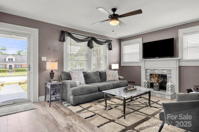 305 E Marion St, Kershaw, SC 29067 - living area featuring a ceiling fan, healthy amount of natural light, and light wood finished floors