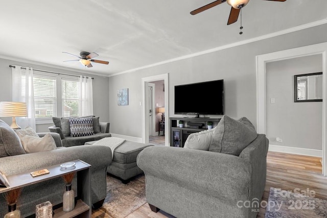 305 E Marion St, Kershaw, SC 29067 - living area with a ceiling fan, ornamental molding, and light wood-style floors