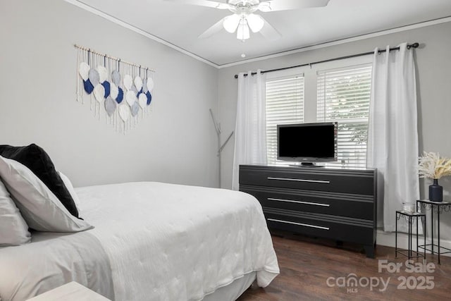 305 E Marion St, Kershaw, SC 29067 - bedroom with ornamental molding, dark wood-style floors, and ceiling fan
