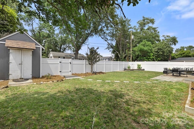 305 E Marion St, Kershaw, SC 29067 - fenced backyard featuring a gate, a patio, and a shed