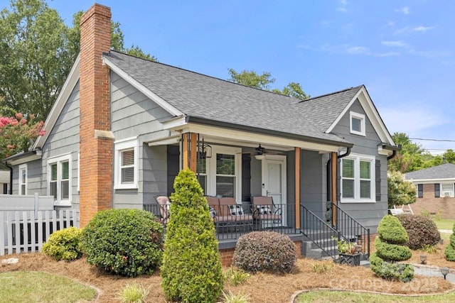 305 E Marion St, Kershaw, SC 29067 - bungalow-style house featuring covered porch, a chimney, roof with shingles, and a ceiling fan