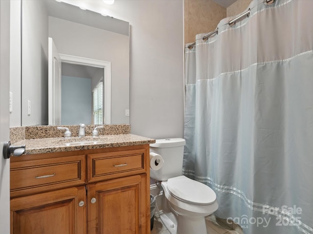 8407 Rolling Fields Rd, Mint Hill, NC 28227 - bathroom featuring vanity, tile patterned flooring, and curtained shower