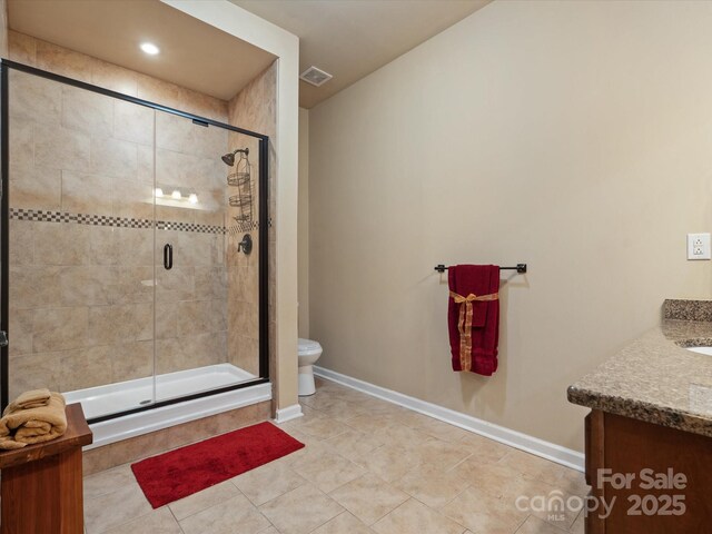 8407 Rolling Fields Rd, Mint Hill, NC 28227 - full bathroom featuring vanity, a shower stall, and tile patterned flooring