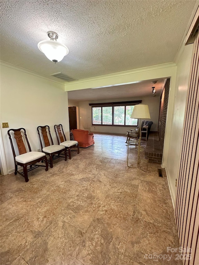 2128 Senior Dr, Charlotte, NC 28216 - sitting room featuring ornamental molding and a textured ceiling