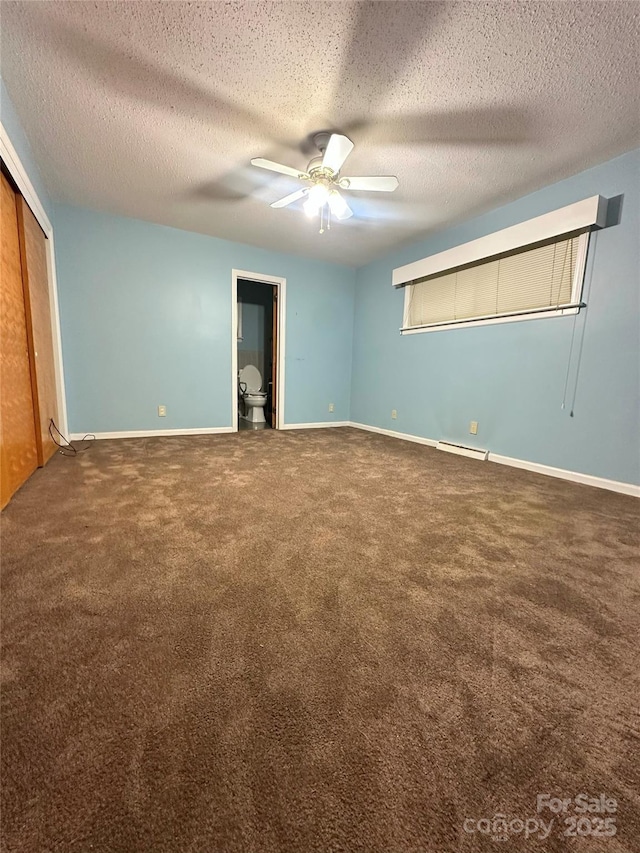 2128 Senior Dr, Charlotte, NC 28216 - unfurnished bedroom with carpet flooring, a closet, a ceiling fan, and a textured ceiling
