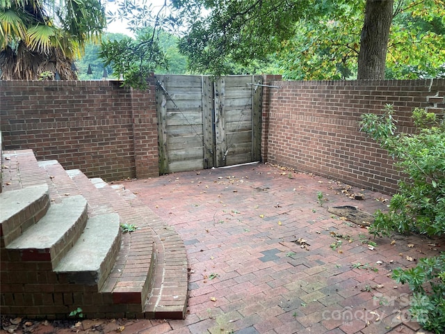 1162 Brighton Pl, Charlotte, NC 28205 - view of patio / terrace featuring a gate