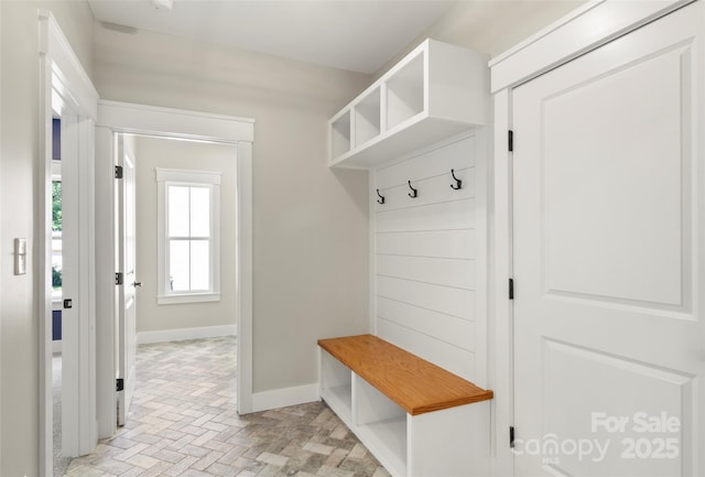 299 Collingswood Dr, Concord, NC 28027 - mudroom featuring baseboards and brick patterned floors