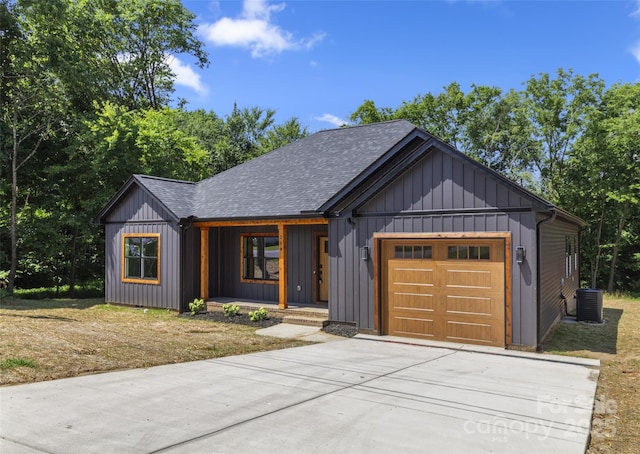 299 Collingswood Dr, Concord, NC 28027 - modern farmhouse style home with driveway, an attached garage, a porch, roof with shingles, and board and batten siding