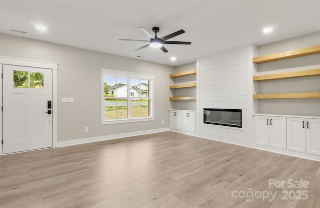 299 Collingswood Dr, Concord, NC 28027 - unfurnished living room with a ceiling fan, light wood-style flooring, a fireplace, and recessed lighting