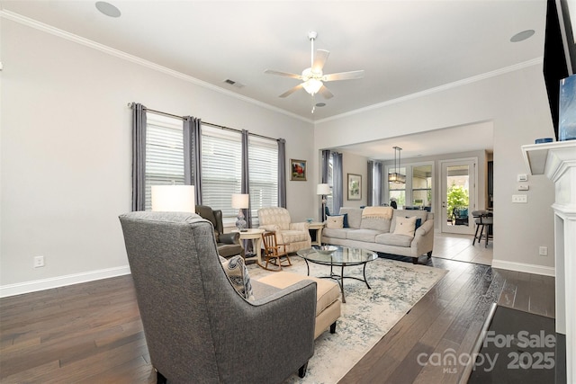 7025 Overjoyed Xing, Charlotte, NC 28215 - living room with hardwood / wood-style floors, a ceiling fan, and ornamental molding