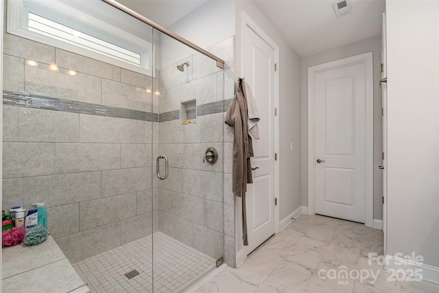 7025 Overjoyed Xing, Charlotte, NC 28215 - bathroom with a shower stall and marble finish floors