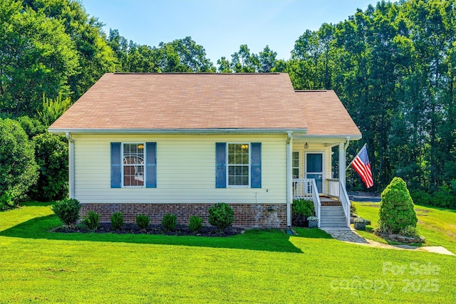 659 Primrose Ln NW, Concord, NC 28027 - view of front of property featuring a front lawn and covered porch
