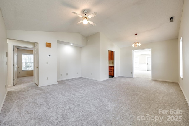 659 Primrose Ln NW, Concord, NC 28027 - unfurnished room with lofted ceiling, light carpet, and a ceiling fan