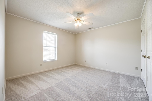659 Primrose Ln NW, Concord, NC 28027 - unfurnished room featuring crown molding, a textured ceiling, a ceiling fan, and light carpet