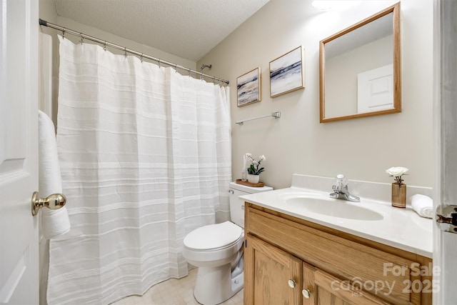 659 Primrose Ln NW, Concord, NC 28027 - bathroom featuring vanity and a textured ceiling