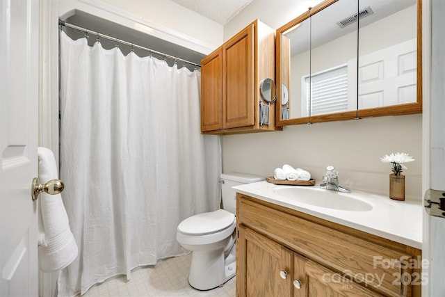 659 Primrose Ln NW, Concord, NC 28027 - bathroom with vanity and toilet