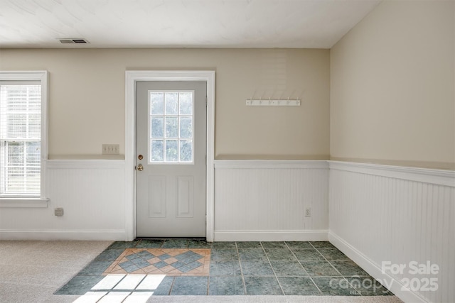 659 Primrose Ln NW, Concord, NC 28027 - doorway with wainscoting