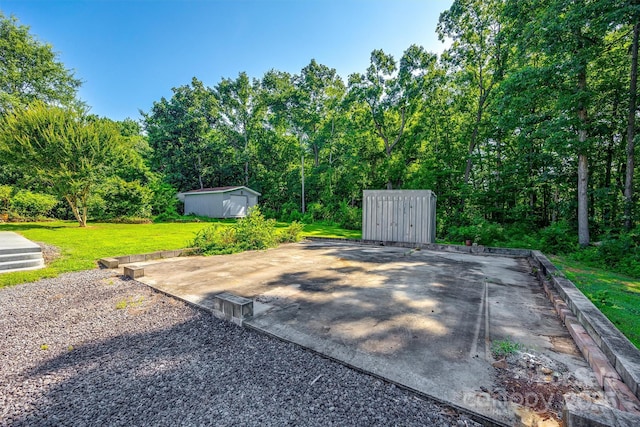 659 Primrose Ln NW, Concord, NC 28027 - view of patio with a storage shed