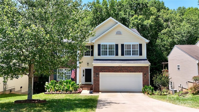 3236 Wicklow Ln, Clover, SC 29710 - traditional home with driveway, brick siding, a garage, and a front yard
