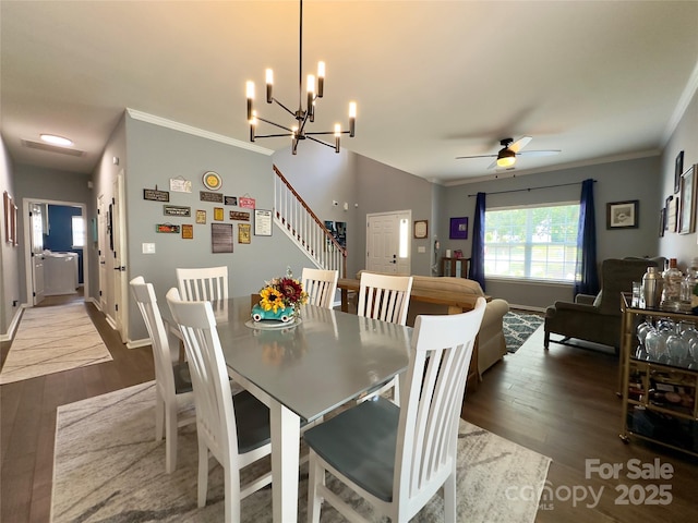 3236 Wicklow Ln, Clover, SC 29710 - dining room featuring dark wood-style floors, a ceiling fan, crown molding, stairway, and a chandelier