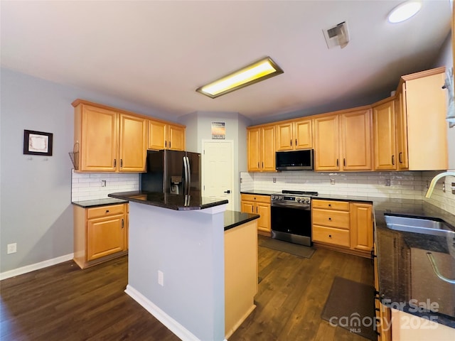 3236 Wicklow Ln, Clover, SC 29710 - kitchen with electric range, fridge with ice dispenser, tasteful backsplash, dark wood finished floors, and a center island