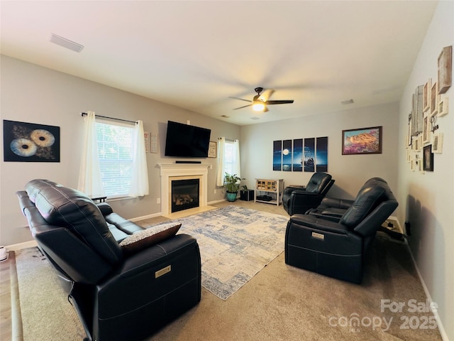 3236 Wicklow Ln, Clover, SC 29710 - living room featuring plenty of natural light, ceiling fan, and a fireplace with flush hearth