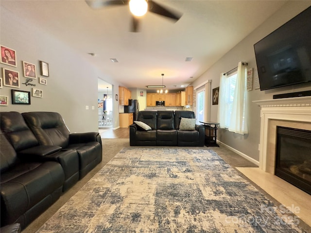 3236 Wicklow Ln, Clover, SC 29710 - living area with a ceiling fan, carpet flooring, and a fireplace with flush hearth