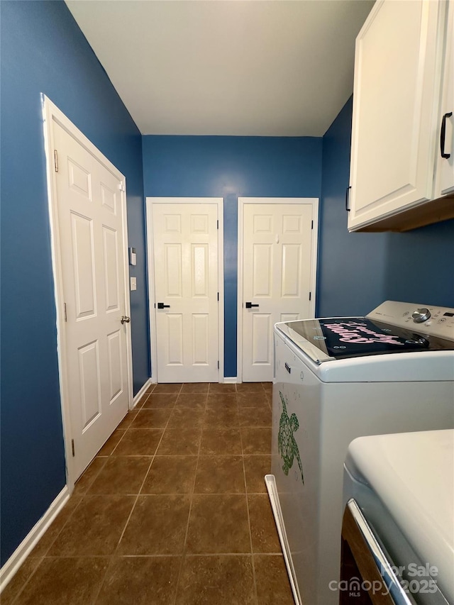 3236 Wicklow Ln, Clover, SC 29710 - laundry area with cabinet space, washing machine and clothes dryer, and dark tile patterned flooring