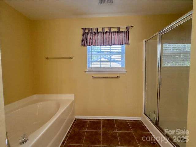 3236 Wicklow Ln, Clover, SC 29710 - bathroom featuring a shower stall, tile patterned floors, and a garden tub
