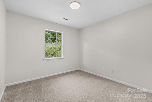 6907 Spandril Ln, Charlotte, NC 28215 - carpeted empty room featuring baseboards