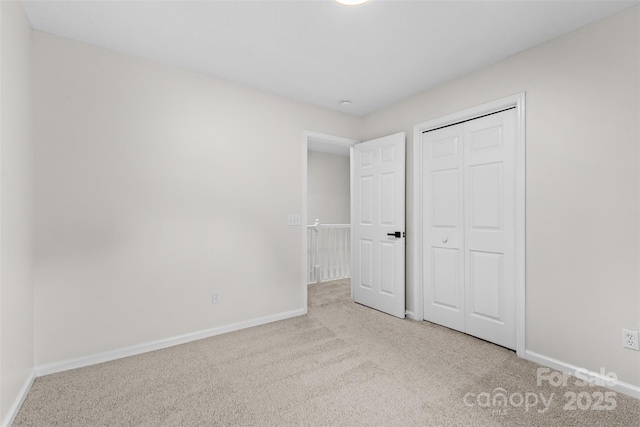 6907 Spandril Ln, Charlotte, NC 28215 - unfurnished bedroom with carpet and a closet