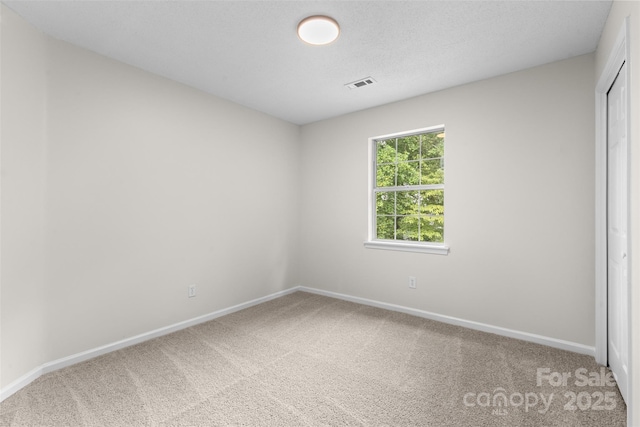 6907 Spandril Ln, Charlotte, NC 28215 - carpeted empty room with baseboards