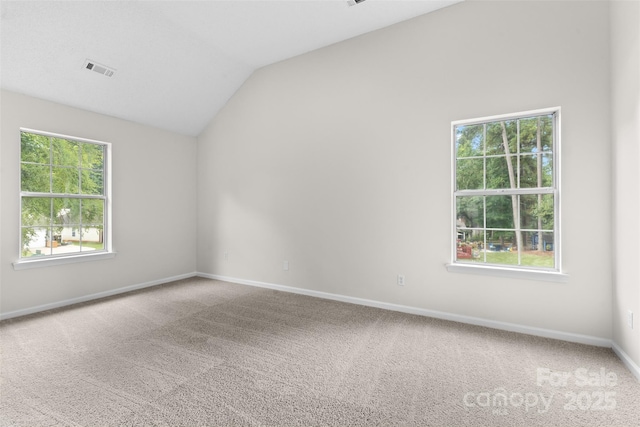 6907 Spandril Ln, Charlotte, NC 28215 - unfurnished room featuring carpet, healthy amount of natural light, and vaulted ceiling