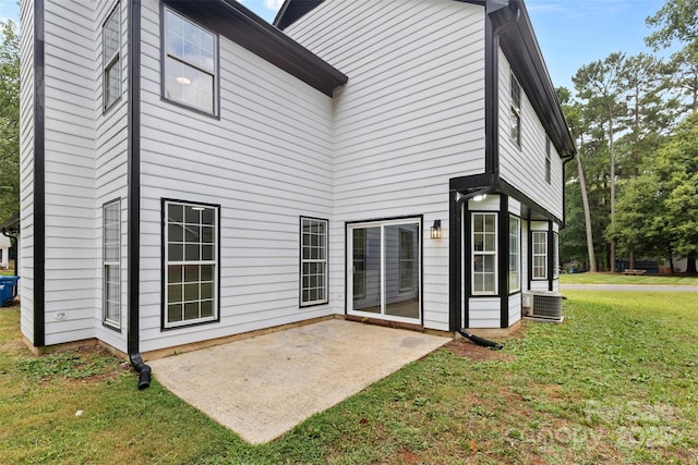 6907 Spandril Ln, Charlotte, NC 28215 - rear view of property with a patio area and a yard