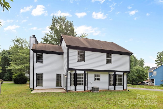 6907 Spandril Ln, Charlotte, NC 28215 - rear view of property with a patio area, a chimney, and a yard